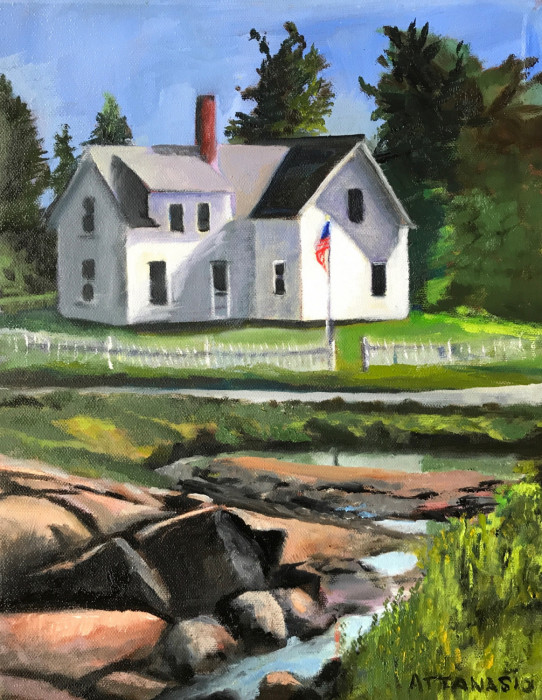 House on tidal creek with flag